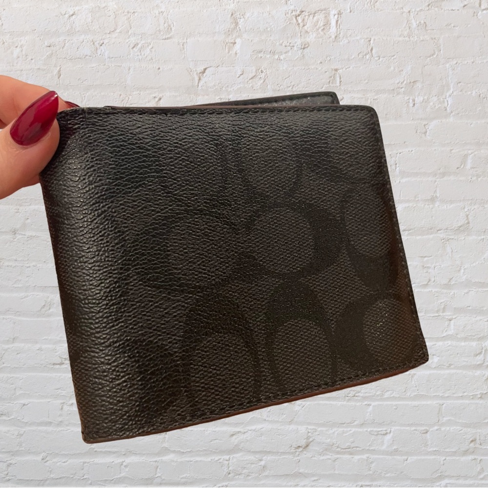 Men’s dark brown Coach wallet